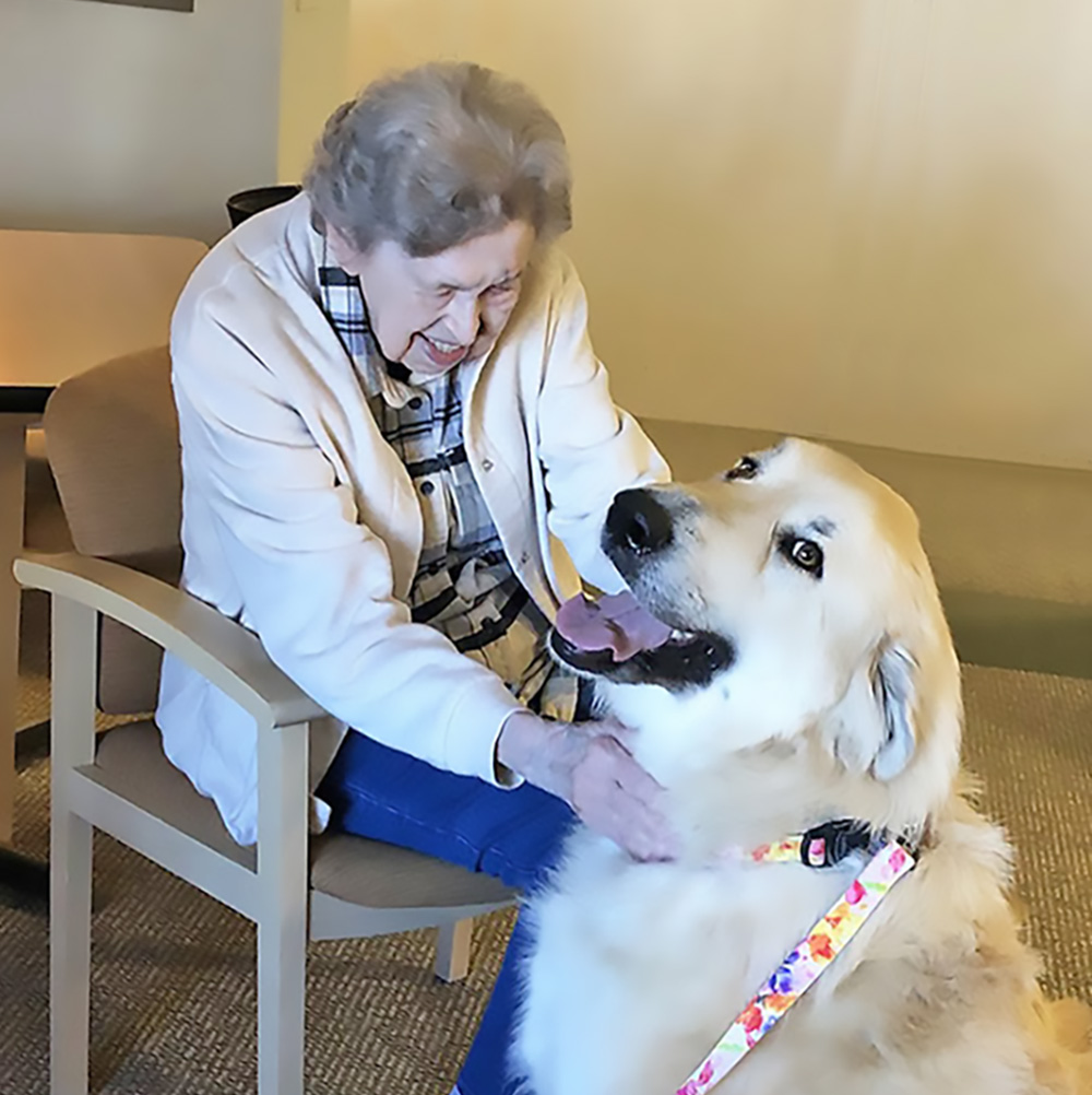 Park Place Assisted Living resident enjoys pet therapy